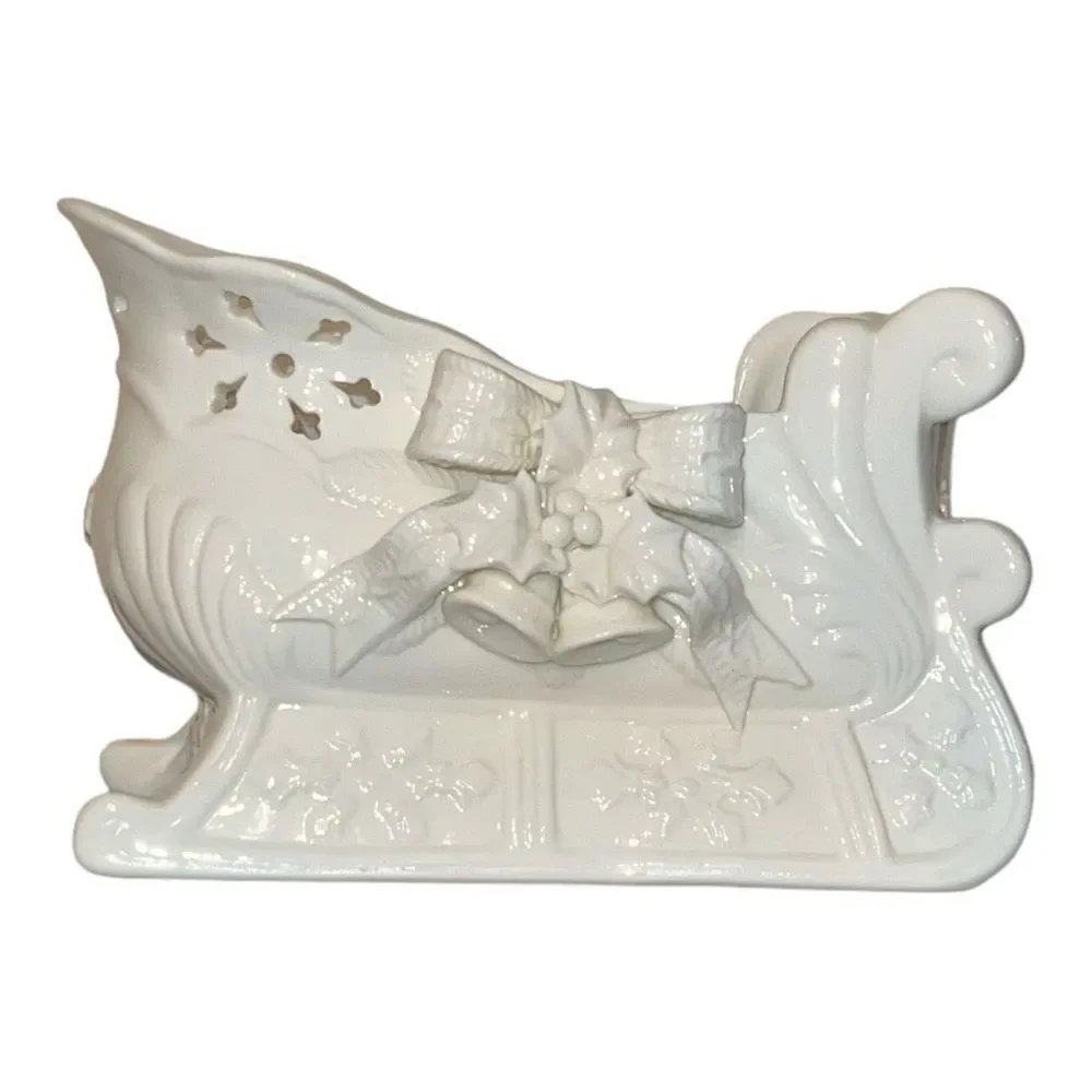 Ceramic sleigh candy dish, basket with Holly bow and snowflakes